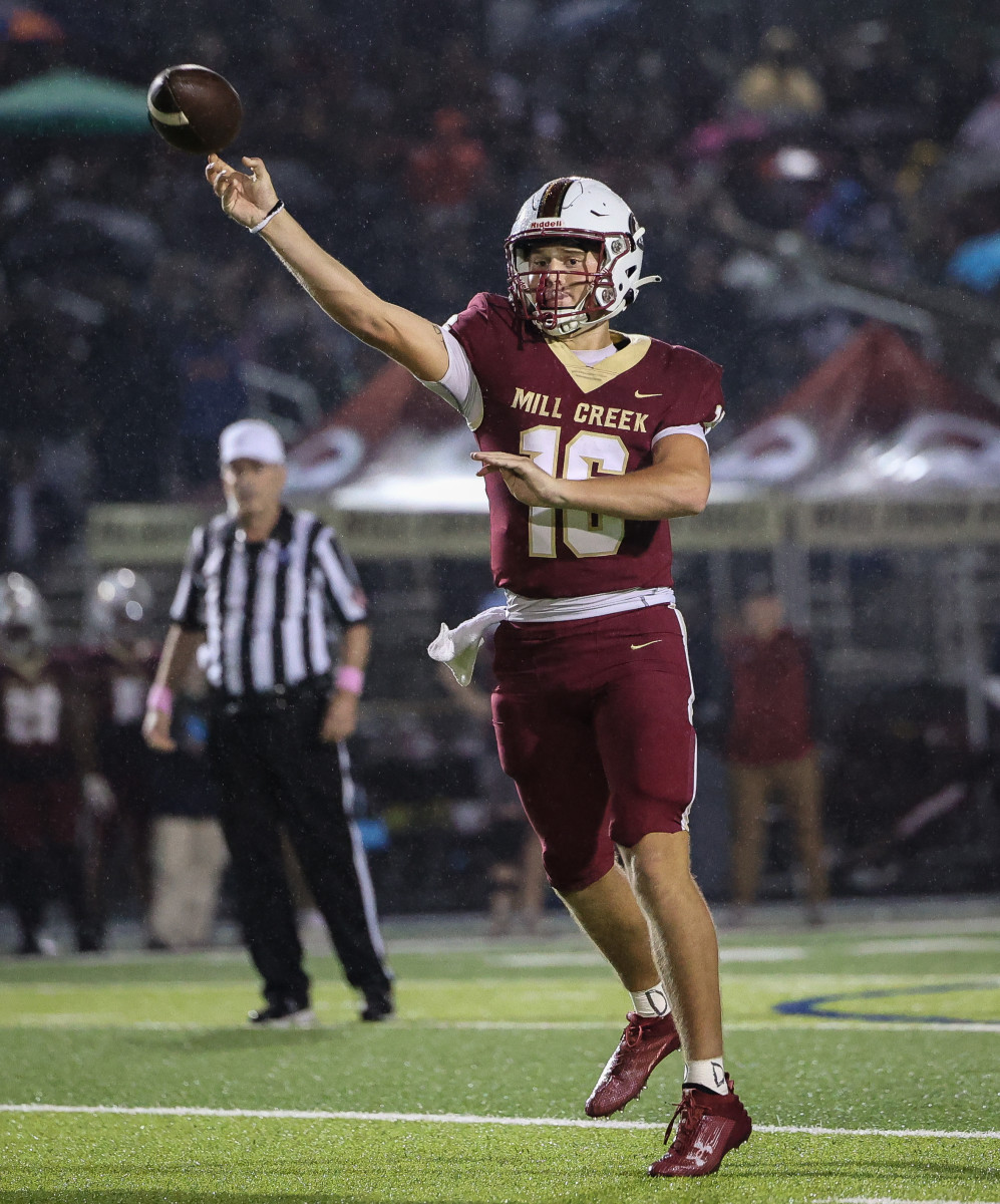 Mill Creek quarterback Shane Throgmartin releases a pass. 11/13/2023.